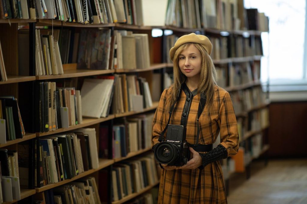 student in library