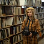 student in library